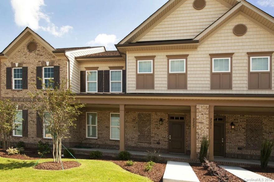 Enjoy life in this beautiful outstanding town home in Christenbury Walk. Built in 2014.  First floor library/office. upgraded hardwood floor throughout first level. Granite counter top. Get access to Manor house with pool, tennis courts, fitness center and outdoor fire place. Close to the popular Concord Mills and minutes from I-85
