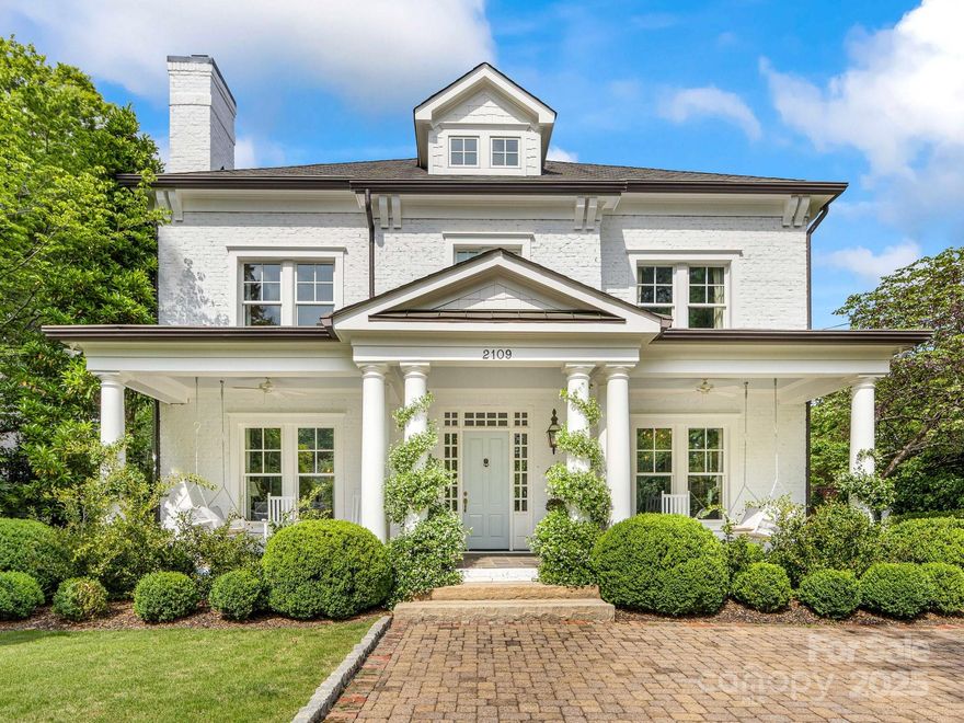 Exquisite custom-built Myers Park home masterfully combines modern amenities, luxury finishes, and timeless elegance. Reclaimed brick, detailed architectural moldings, and deep Southern porches provide historic character to this modern home. Soaring 10’ ceilings and modern layout make the home grand and welcoming. Chef's kitchen is a showstopper with Calacatta Gold marble countertops, custom built-in china cabinet, Wolf range, Miele dishwasher and paneled beverage drawers. Schumacher wallpaper and Waterworks, Lefroy Brooks, & Rohl fixtures. Expansive paneled family room open to kitchen, perfect for entertaining. Luxurious primary suite with private terrace, spa-like bathroom, and two large walk-in closets. Finished lower level offers room for home gym, playroom, and storage. Detached two-car garage with guest house. Private backyard features beautiful pergola covered patio with stone fireplace and grill, surrounded by manicured landscaping. A true sanctuary in the heart of Myers Park.