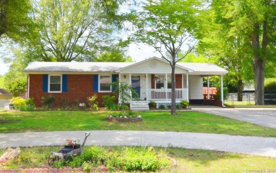 Adorable Home plus 2nd Living Quarters!! 1,500 heated sf total! Mother-In-Law Suite. Main home has 3 bedrooms & 2 baths & 2nd quarters has 1 bedroom & 1 bath, kitchenette/Den. Ceramic tile in kitchen, dinning, suite & baths. Pergo laminated floors, Custom Cabinets & Finished attic. No popcorn ceilings. Newer windows. 2008 Roof! 2011 W/H! Huge & flat fenced-in backyard w/bi-level deck on almost half an acre. Carport, extended & half moon driveway. Established neighborhood, NO HOA!! Many updates!!