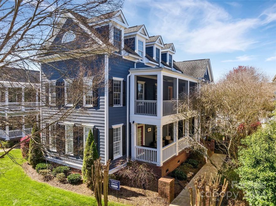 Baxter Village Town Center. This is THE location!  Walk to everything!  Beautiful Charleston style! Primary Bedroom on Main, Gorgeous remodeled kitchen, Quartzite countertops, tile backsplash, newer stainless appliances includes washer, dryer & fridge.  Newly updated primary bath, large walk in shower, new vanities, faucets & lighting, features Kohler.  Real Hardwoods Main floor, Primary Bedroom, Stairs, & Upstairs hallway. Updated tile flooring, mirrors, lighting in all bathrooms.  Bath 3 ensuite & newer vanity. 3rd Floor bonus & office Great space! Walk in storage! Garage has 200 sqft loft storage with ladder, Juicebox electric vehicle charge port. Ring battery free cameras.  Exterior paint siding & trim 2023, Interior March 2024. Tankless water heater. Natural gas outdoor grill.  Fenced backyard, patio, landscape lights. Two porches! Enjoy sitting on the front porch swing! Fort Mill Schools, verify assignments with FMSD due to freezes. Convenient to I-77, Kingsley, Greenway & more!