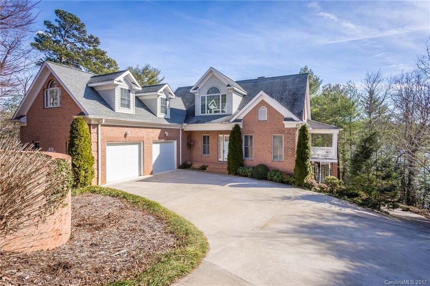 Enjoy lakefront living this quality custom built home at Lake James. Enter the home throught the two story foyer flooded with light from large second story windows. Enjoy a large kitchen with adjacent breakfast nook surrounded by windows. The formal dining room has built in cabinetry and leads direcctly to the warm and bright sunroom with views of the lake. The master suite is also on the main with a large bath and doors that lead to the porch. Easy walk to the lake with covered gazebo and dock.