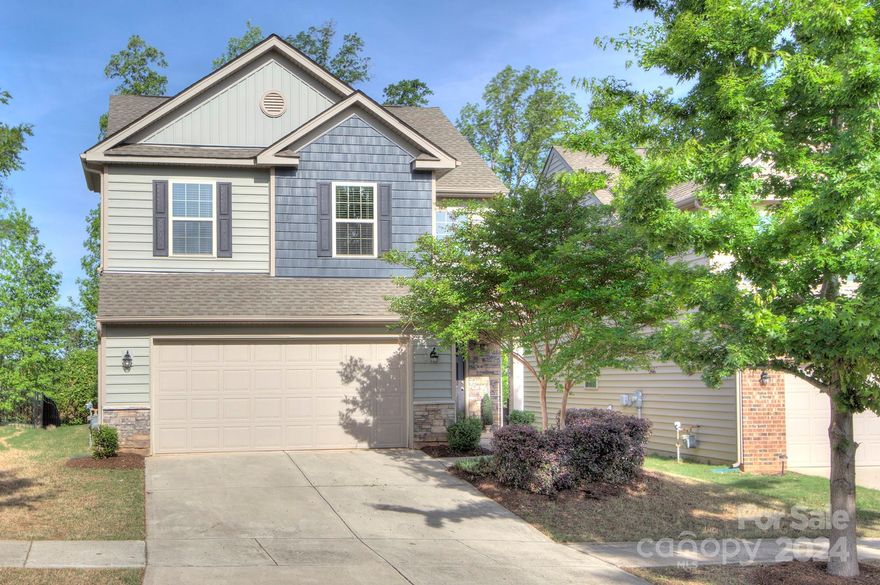 ** Multiple offers…Offer deadline 4/27 at 10 PM**This home is basically new and you can feel the love that filled these walls.  Freshly painted throughout and new carpet/pad.  Open plan on private lot with stone patio and built in stone firepit.  Kitchen has amazing cabinet and (granite) counter space.  All appliances convey (even that amazing double door/double drawer stainless refrigerator!  Laminate wood floors through main level.  Four spacious bedrooms PLUS loft on upper level.  Primary bath with large walk-in closet and en-suite bath boasting separate shower/tub and dual vanity.  The placement in community provides for easy in/out.  This community has AMAZING amenities and this pool/clubhouse are not to be missed!  Fabulous Fort Mill schools are a huge draw.