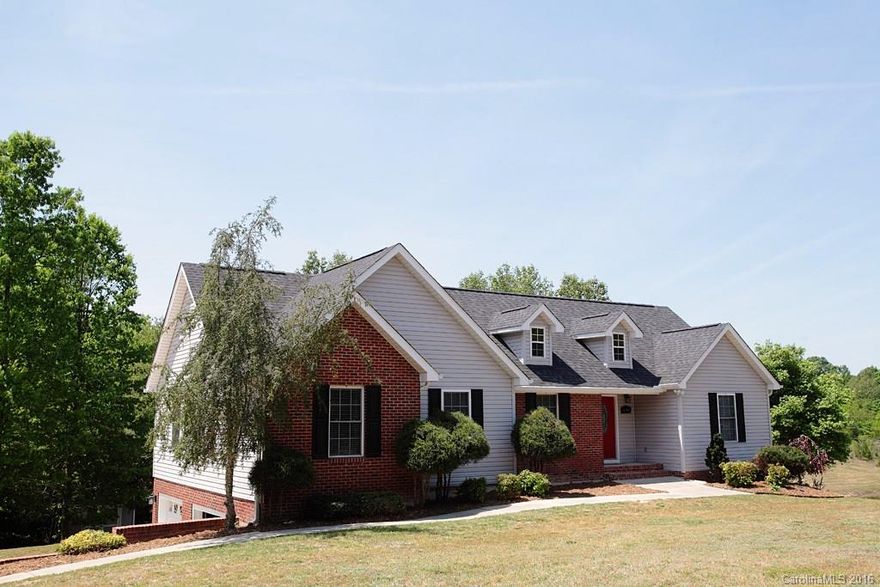 Situated on 3.68 acres, it is the perfect combination of both cleared/usable land and woods. Newly constructed Trek back deck (20x18). Take a walk down the interior stairs to the basement, complete with contemporary stained concrete, galvanized bathroom ceiling and entry to the finished garage/additional gaming area. New roof (2010), New AC and Gas Furnace (2015), fully repiped, natural gas lines added (2105). 30x40 Workshop (2012) in addition to separate lawn shed. USDA 100% Financing.