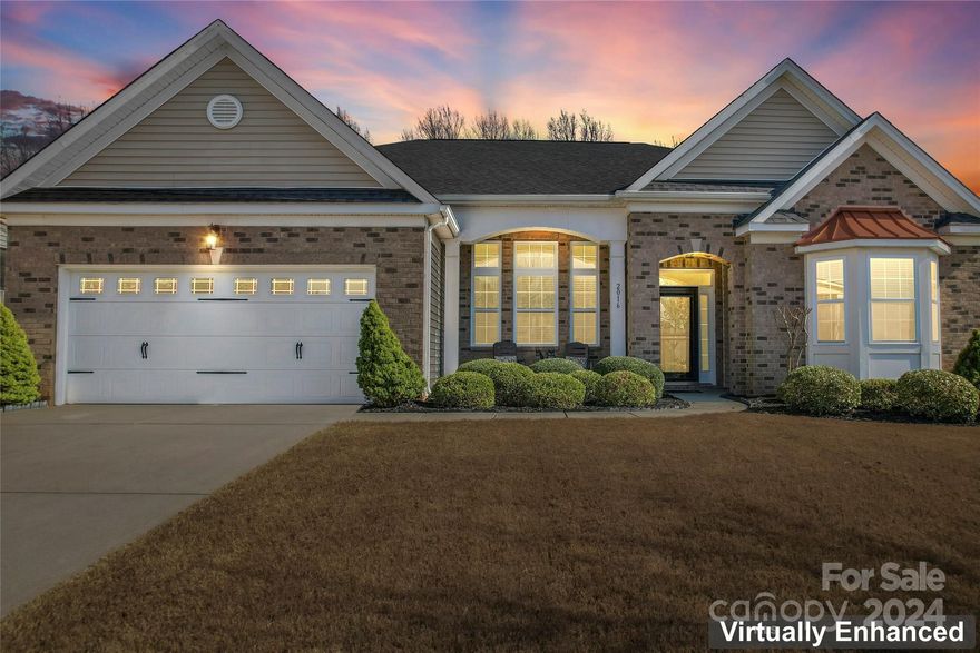 Meticulously maintained and updated one-story home in the desirable Heritage Hall neighborhood. Step inside to vaulted ceilings, hardwoods and gas fireplace in the great room. This open floorplan is the perfect entertaining space! The kitchen has updated tile backsplash, gorgeous neutral wood cabinets, cabinet lighting and stainless steel appliances. The spacious primary suite includes a tray ceiling and attached bath with dual vanity sinks and walk-in shower. The remaining 2 bedrooms are on the other side of the home, the perfect split floorplan!  Relax in the 3 seasons room with LVP flooring and lifeteime warranty Eze-Breeze windows that was just added in 2018, your true home oasis! The private backyard boasts a stamped concrete patio, privacy fence, hot tub and updated landscaping! Enjoy easy living with new HVAC in 2020, new retaining wall in 2022 and new garage doors in 2017. Single owner that has taken amazing care of the property! Close to shopping, restaurants & entertainment!