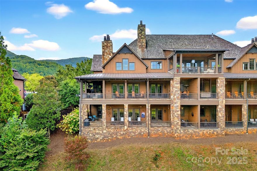 Discover luxury mountain living at its finest in this beautifully appointed Ridgeview unit located in the prestigious gated community of Bright's Creek. Nestled alongside a Tom Fazio designed championship golf course, this lower level unit offers panoramic views of the Blue Ridge Mountains and overlooks the 19th hole an ideal setting for both relaxation and recreation. An elevator in the common area provides convenient access, making coming and going effortless.  Step inside to find a warm, inviting interior featuring a fully equipped kitchen with high-end appliances and granite countertops. The open dining area comfortably seats six, while the charming family room with a stone gas log fireplace and a wet bar creates the perfect space for entertaining. There are two spacious king bedrooms, each with ensuite baths and walk-in closets. The villa’s standout feature is its expansive wraparound porch approximately 1,000 sq ft in addition to 1,695 sq ft of indoor living space. Enjoy al fresco dining for six, rocking chairs for taking in the sunrises and views, a BBQ grill, and a cozy outdoor seating area with its own stone gas log fireplace and TV. The unit is being sold fully furnished and equipped, offering a true turnkey experience so you can start enjoying the mountain lifestyle immediately. Just steps from the golf course and the Water Wheel restaurant, this villa is perfectly positioned to enjoy all that Bright’s Creek has to offer, including walking trails, tennis and pickleball courts, mountain lodge clubhouse, golf shop, fitness center, pool, bowling alley, stables and paddocks, and a 24 hr staffed greeter's cottage to ensure peace of mind. Whether you’re seeking a weekend retreat or year-round mountain living, this unit offers the ultimate blend of comfort, luxury, and natural beauty. These units rarely come available, don’t miss this opportunity to own a stunning, fully furnished mountain retreat in one of Western North Carolina’s most sought-after welcoming close-knit communities.