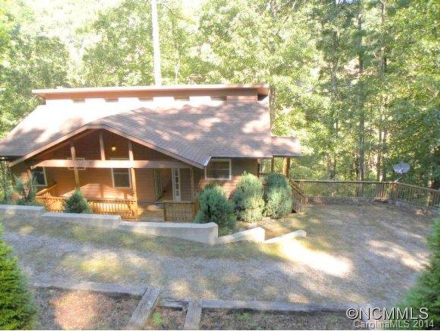 Priced to sell well below market value. Great cabin in the woods, like new house with river view. Lots of deck, hot tub outside, jet tub and propane fireplace inside. Vaulted ceilings with tongue and groove wood accents. Easy access year round. Bring your fly rod and waders.