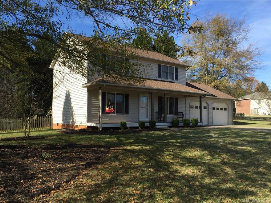 3BD/2.5BA with spacious living room, kitchen with breakfast bar, pantry, and office area! Formal DR! Utility/half bath! Master bath with tiled shower, double vanities, and walk-in closet! Front bedroom has a walk-in closet with carpeted steps for storage and attic access! Back bedroom located to the full bath with tub/shower and new vanity! Double garage with laundry/storage room, workshop, and pull down staircase for additional storage! Covered front porch, nice landscaping, and fenced backyard