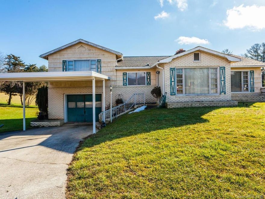 Amazing Opportunity! This property is Zoned R-6, perfect for builder or developer. Two homes currently on the property, one uninhabitable. Close to downtown Hendersonville. This split level 1 1/2 story home with basement has 3 bedrooms, 2 bathrooms, dining room, kitchen and great room in basement. Property includes 9.34 acres of gently rolling land.