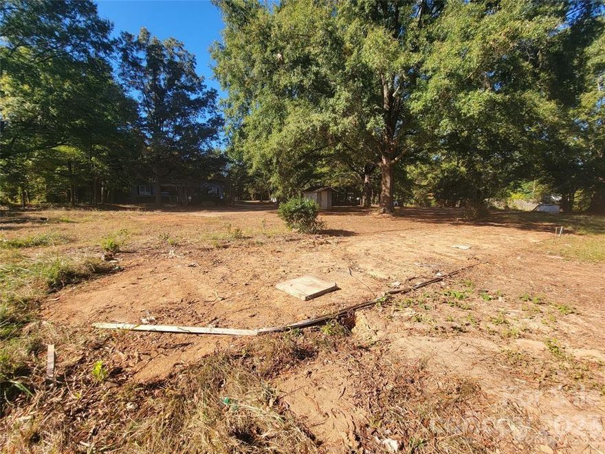 Corner lot with seasonal WATERVIEWS from the back corner of the lot! Just across the street there are waterfront properties that have sold for $1.3-1.5M. There is a septic system on site that is newer according to environmental records (2019) suited for 2 bedrooms. There is a shared well agreement with the property across the street effective 2022 (see attachments). There is an abandoned well on site. Working on approval from the county for a 1791 sq ft Pride Model Double-wide home. Contact us for more information.