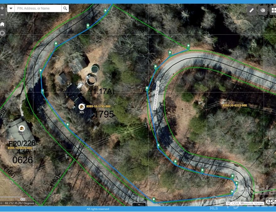 2.5 miles from Main Street Brevard, this parcel has so much potential. It is being sold "AS IS" There is an old mobile home on the property, a couple of sheds, and an old swimming pool. I have placed no value in these items, and the mobile home is not livable. There is a well and septic on the property, but the county's records do not date back that far, so we have no records pertaining to it. With a little TLC, this could be a great building lot. The lot is very easy access with over 1,000 feet of paved frontage on Rich Mountain Road. It would be great if you have an RV and want to build a small Mountain home to visit. It has some very nice views. This 1.17 acre, unrestricted lot close to town is something that is hard to find. It has amazing potential and a lot of the work is already done. WE HAVE A MULTIPLE OFFER SITUATION AND ARE ASKING FOR HIGHEST AND BEST OFFERS BY WEDNESDAY THE 25TH AT 12PM!!!!