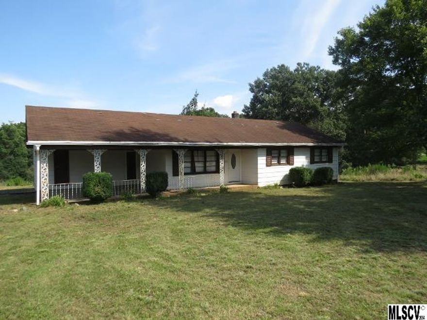 6.41 acres in North Iredell with home, shed and barn. This property is in need of repair but has a lot of potential. Quiet rural area. This would be perfect for horses or farm animals. HVAC unit is missing. Bring offers!