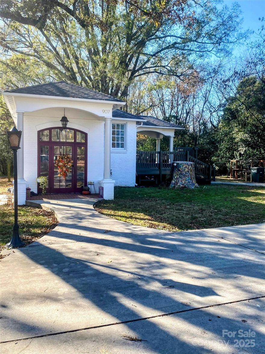 Prime Commercial Opportunity Just Steps from Downtown Monroe, NC!

Looking for the perfect investment, business location, and/or development opportunity in a fast-growing area? This 2.58-acre property near downtown Monroe has it all - a mix of open green space, light woods, and a beautifully updated 1,000 sq. ft. historic building full of charm and character.

The building has been thoughtfully remodeled into a stylish, flexible space featuring three separate rooms and a restroom on the main level, plus a finished basement with an open room, extra storage, and utility sink. New HVAC in 2023.

A handicap-accessible ramp, concrete parking lot, and great visibility make it easy for customers to find and access your business.
Currently, the property has two established tenants on month-to-month lease that are wonderful and prompt with their payments:
A massage parlor on the main level paying $800/month
A produce stand in the basement paying $600/month

That’s instant rental income while you plan your next move!

Zoned Neighborhood Business (NB), this location is perfect for a wide variety of uses: retail, food service, boutique shops, or professional offices. (full list of uses are on the flyer in attachments)

Situated at the busy intersection of N. Charlotte Ave and Concord Ave, you’ll enjoy approximately 350 feet of prime road frontage and outstanding daily traffic - just seconds from downtown Monroe’s shopping, dining, and entertainment and additional city parking. 

Don’t miss this rare find - a property that combines location, versatility, and endless income potential in the heart of Monroe’s growth corridor! Schedule a showing today!!