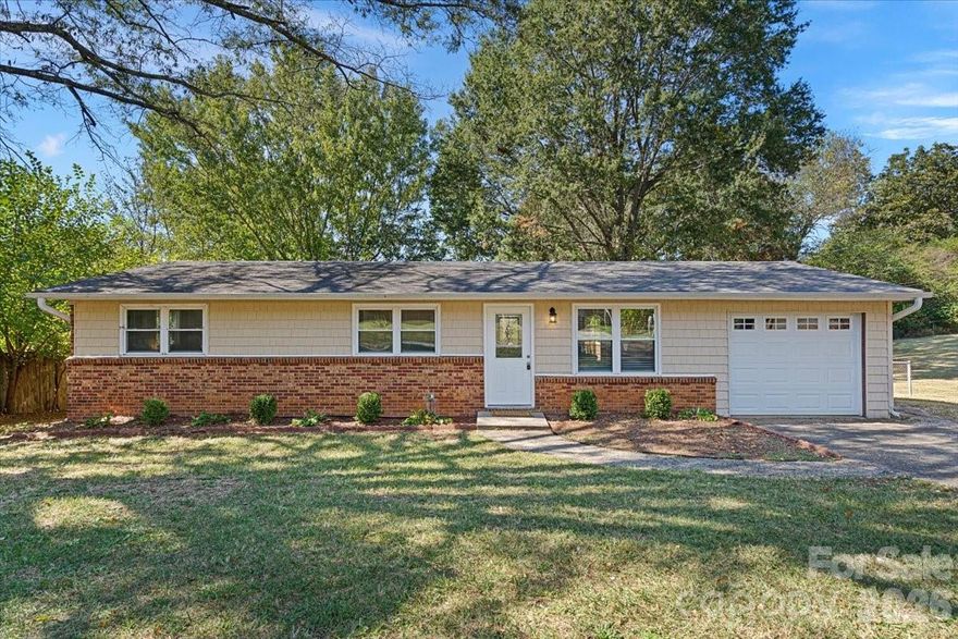 Charming ranch-style home featuring an open and inviting floorplan! The spacious living room flows seamlessly into the dining area and updated kitchen, creating the perfect space for entertaining and everyday living. Enjoy durable LVP flooring throughout the home, along with an abundance of natural light that fills every room. This home offers 3 bedrooms and 2 full baths, including a beautifully updated kitchen with granite countertops. Step outside to a great back deck—ideal for relaxing or hosting gatherings.