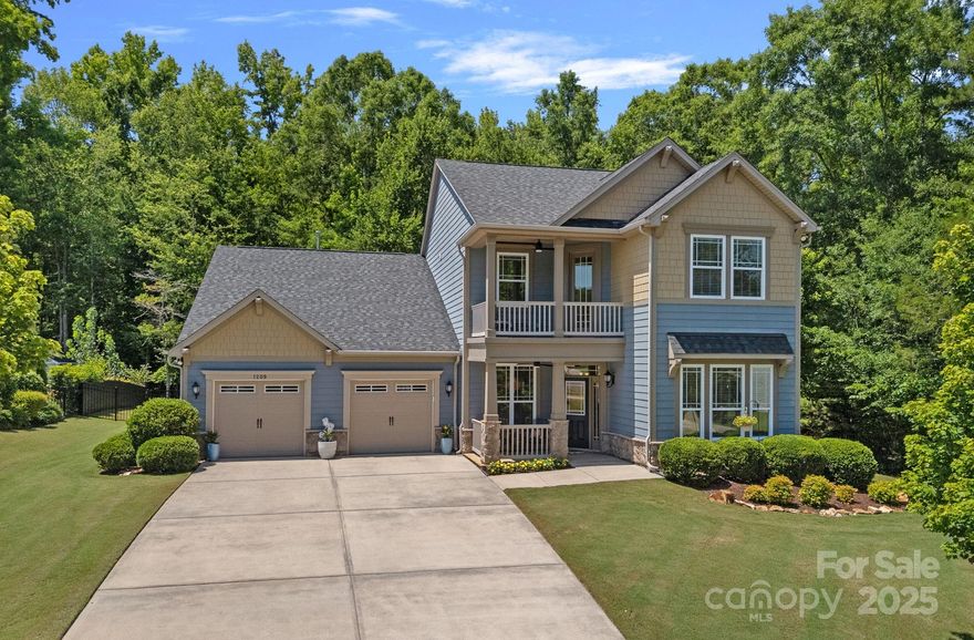 Welcome to 1209 Shelly Woods Drive where pride of ownership and location go hand in hand. This one-owner home has been meticulously maintained with smart updates like new wood flooring in the family room, updated lighting, fresh exterior paint, and a new dishwasher. The bright white kitchen with a huge island opens to a cozy family room with a gas fireplace, perfect for everyday living or hosting. Main-level primary suite with a beautiful bathroom and huge walk-in closet. Upstairs you'll find 3 spacious bedrooms, including a junior suite and 2 full baths - ideal for guests or growing families. The patio and porches invite both dining and relaxing. Nestled on a .62-acre lot provides privacy and plenty of space to enjoy the Carolina weather.  Located in a friendly neighborhood with a pool and zoned for Indian Land schools, you’re also just minutes from shopping, dining, and everything you need. A perfect fit for families or empty nesters. This one checks every box.