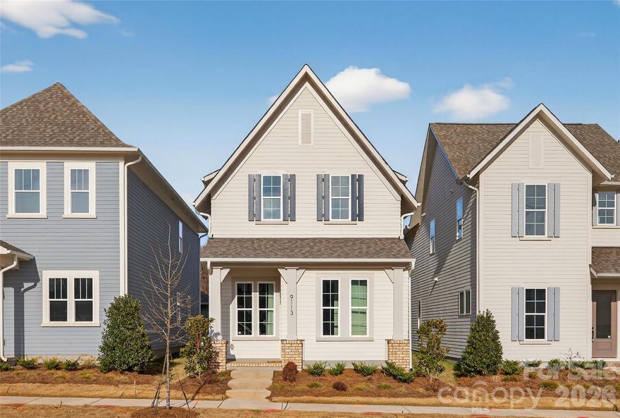 NEW CONSTRUCTION in East Charlotte -This gorgeous home has impressive front columns positioned on large brick pillars. This open concept design has 10' ceilings & 8' doors/cased openings on first floor. Upgraded design package w/stacked perimeter cabinets, undercabinet lighting, vented range hood, tile backsplash, quartz counter tops, & center island. Walk-in pantry. Ceiling beams in family room w/electric fireplace & judges paneling detail. Luxury vinyl plank flooring on main level & upper hallway. Drop Zone w/stained seat, upper shelf, brackets & hooks. Primary bedroom on main level w/LVP flooring, full bath, double vanity, tiled shower & huge walk-in closet. Cabinets in laundry room above w/d area. Open stair rails w/oak treads. 9' ceilings on upper level w/large bonus room, 2 guest bedrooms w/walk-in closets. Tub/shower combo in shared bath w/ceramic tile walls & flooring. Ring doorbell & camera w/Yale door lock. Covered rear porch & 2-car detached garage w/electric car charger. Front lawn maintenance & irrigation covered by HOA. *This home has been beautifully staged on the main level for showings*