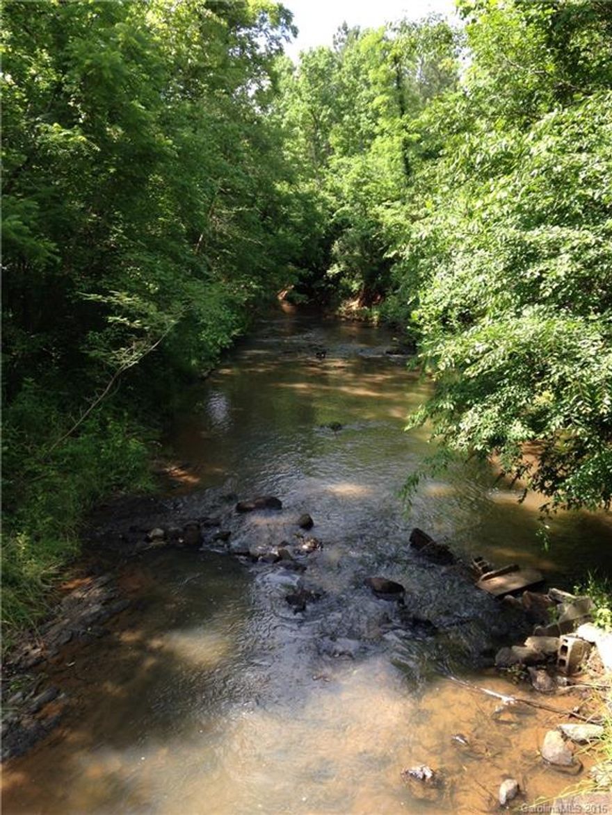 $1995.00 per acre (firm price) for this outstanding property wooded, with streams and nice big creek. rolling topography, lots of road frontage. wildlife, deer, turkey, rabbit,  trails cut for hunting and 4 wheelers. PLEASE DO NOT ENTER PROPERTY WITHOUT AN APPOINTMENT DURING HUNTING SEASON, IT MAY BE DANGEROUS.