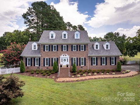 Photo of 11215 Idlewild Road, Matthews, NC 28105 (MLS # 4281881)