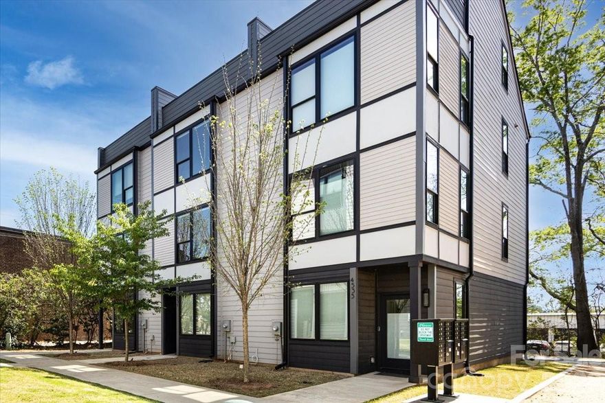 This stunning Bronson Square Townhome, built by renowned Copper Builders, is part of an exclusive collection of 18 luxury residences in Charlotte’s desirable Lower South End (LoSo). Its modern design is complemented by thoughtfully designed interiors, including a spacious open floor plan, a two-car garage, rooftop terrace, and premium finishes throughout. The unit features three spacious bedrooms, three and a half bathrooms, and a chef-inspired kitchen with sleek cabinetry and premium fixtures. Crafted for urban sophistication, this property offers a rare opportunity to own in one of Charlotte’s most lively neighborhoods, just minutes from South End’s vibrant scene. Situated in a private yet accessible area, these modern townhomes balance privacy, walkability, and upscale convenience. Residents can walk or bike to nearby restaurants, local breweries, and access the Blue Line light rail. With its prime location and contemporary style, 4531 Radler Court is both a luxurious residence and a promising investment in Charlotte’s thriving city life.