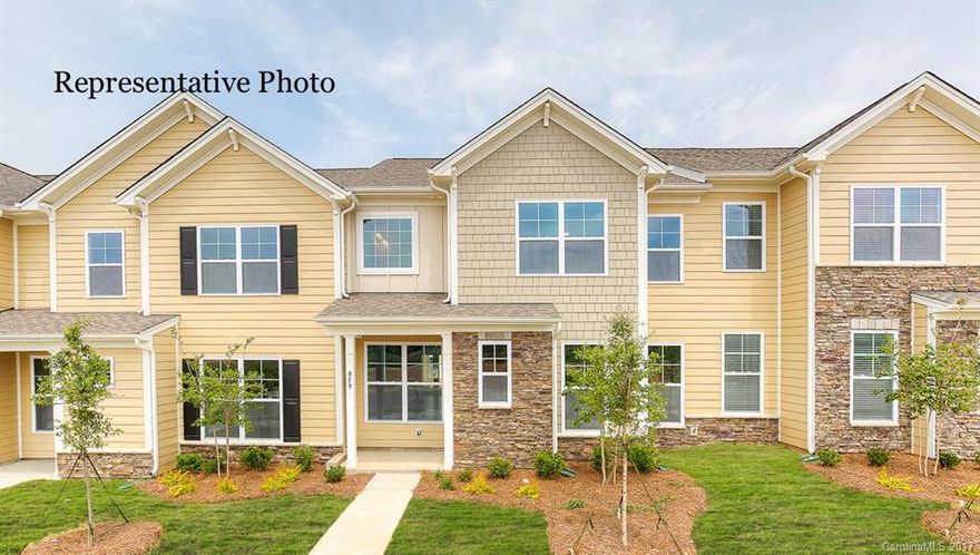 2 Story Townhome- Alley Load Garage with beautiful view from the Front Porch! Incredible SPACE and VALUE. LOW Maintenance townhome! The Litchfield has the master bedroom, laundry and HUGE LOFT upstairs. Open floorplan featuring a Guest Suite and Full Bath on the main level! Beautiful 5" Hardwood flooring and heavy molding on 1st floor. Walk-in pantry,  kitchen island, granite countertops, stainless steel appliances, gas cooking, and 2 Car finished garage.