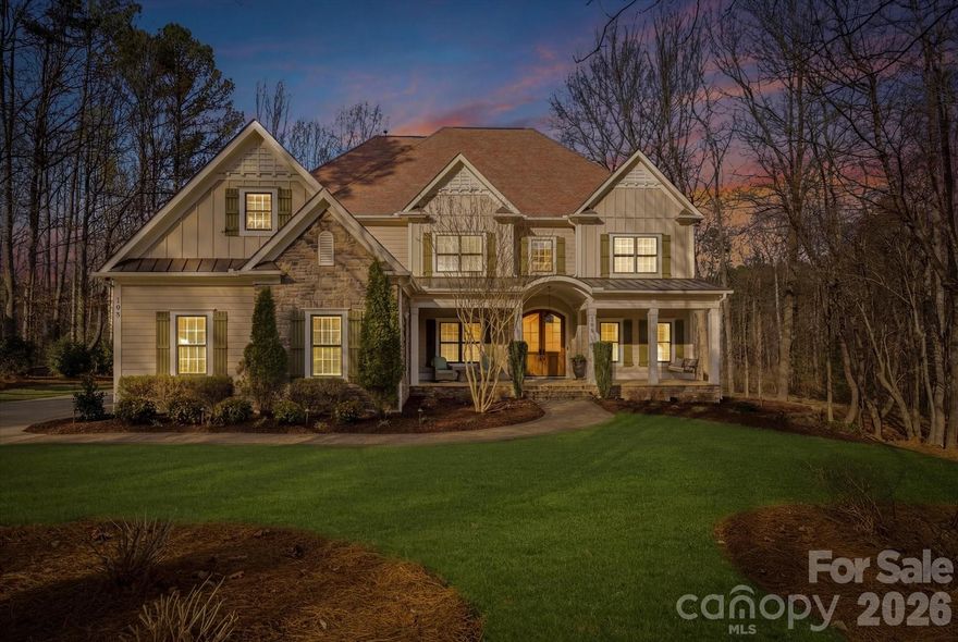 Discover the extraordinary in this custom-built one owner home, boasting unparalleled location & charm within the highly coveted subdivision of The Farms. From the rocking chair front porch to the sprawling, park-like rear yard & magnificent outdoor living spaces, this property offers a truly elevated lifestyle. There is an exceptional array of amenities, including an Olympic-size pool &  clubhouse, tennis & pickleball courts, playgrounds, walking trails, covered grilling areas, and community events for all ages. For lake enthusiasts, the convenient boat storage is just down the road from the  public boat ramp for easy access to the waters of Lake Norman. Boasting over 5,200 square feet of meticulously maintained living space on a 1.3-acre lot, this home offers room for everyone with 5 bedrooms and 4 full, 2 half bathrooms. The main level features Australian Cypress wood floors throughout, gracing the formal dining room, private office, spacious great room, kitchen & breakfast area. A significant bonus is the main-floor in-law suite, which provides exceptional privacy and convenience. This suite includes its own screened porch, a step-in shower, and is thoughtfully outfitted to serve well for accessibility needs. The second floor is home to the expansive primary suite, also featuring the stunning Australian Cypress flooring. This luxurious retreat offers a private balcony overlooking the lush backyard—the perfect spot for a peaceful morning coffee. The updated, spa-like primary bath and an enormous walk-in closet complete this lavish space. The upper level also features one additional ensuite bedroom, two well-appointed secondary bedrooms, a newly updated shared bath with a large tiled step-in shower, and a secondary office space. The third level presents a versatile space ideal for a billiards room, home gym, or bonus room. It is complemented by an additional half bath, a beverage refrigerator, and conditioned storage/flex space. The backyard is an absolute showpiece—a true nature lover's paradise. Abutting HOA-owned property, the 1.3-acre lot lives much larger than its size suggests. It is designed for grand-scale entertaining with a large paver patio, a built-in firepit, a stunning pergola, and a built-in grill area, perfect for alfresco dining and evening fireside chats. The Lake Norman School district is an added bonus. This exceptional property is a rare find in quality & lifestyle!