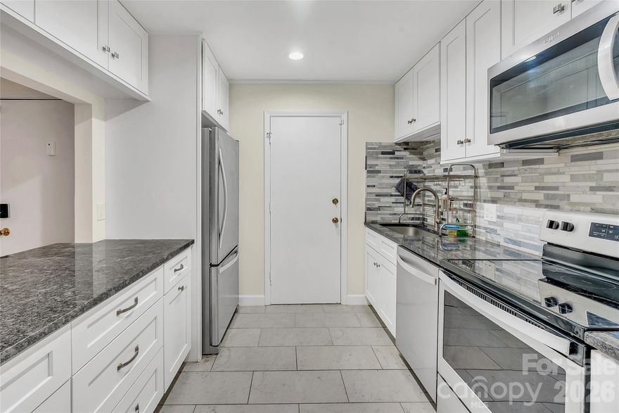 Welcome to this charming first-floor condo at 4754 Hedgemore Drive in Charlotte’s desirable 28209 area! Enjoy convenient, step-free living in this well-maintained 2-bedroom, 2-bathroom home, perfectly positioned near the Little Sugar Creek Greenway, Park Road Shopping Center, Montford Drive hotspots, and more.
Step inside to an inviting open layout with modern touches throughout. The kitchen has been beautifully renovated, featuring all-new appliances and an open flow into the great room—ideal for everyday living and entertaining.
Recent upgrades include:
•  Durable, stylish laminate flooring throughout
•  A reliable, updated HVAC system
•  The master bathroom remodeled with tile flooring and a luxurious bathtub-to-shower conversion
•  Energy-efficient updates like a new sliding door in the great room and replacement windows in all bedrooms
This ground-level gem offers easy access, ample natural light, and the perks of community living—including a pool—in a prime location just minutes from SouthPark, Uptown, South End, and major highways. Don’t miss this move-in-ready opportunity!