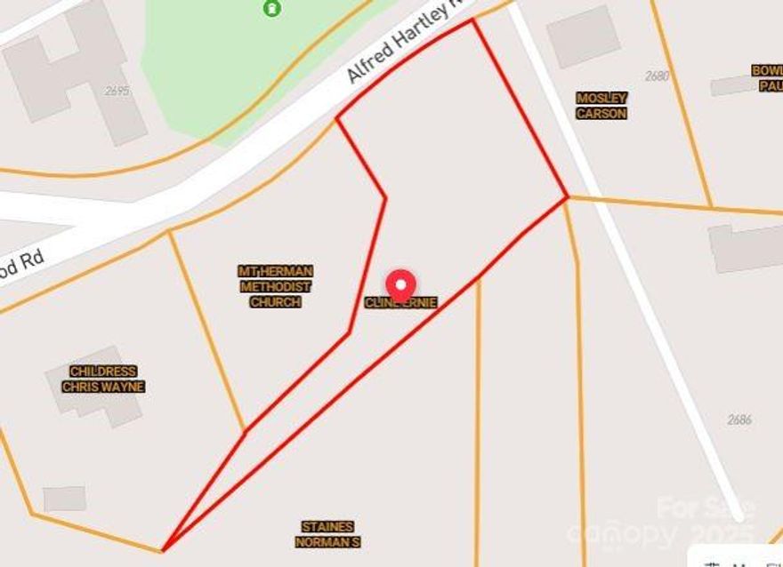 Cleared/wooded parcel located on Alfred Hartley Rd in Lenoir. Peaceful setting with convenient access to town. Suitable for residential use.