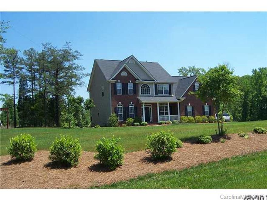 Tired of cookie cutter lots in cookie cutter neighborhoods? Spread out in this beautiful 2 story home situated on 2.3 acres with lots of privacy & room for gardening. Beautiful HWs in Foyer, Kitchen/Breakfast area,  + formal LR &  Dining that has wide crown & picture frame molding. Spacious Great Rm w/fireplace. Upstairs Bonus offers flex space for Media/Office/Play Rm or use as 4th BR. Master Suite has private bath w/dual sink vanity, garden tub & separate shower. In-ground irrigation.