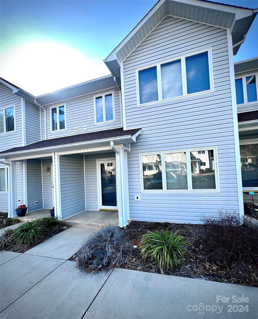 Move in Ready 2 Story Townhome in White Oak Manor. This unit includes 2 bedrooms 1 1/2 bath, an open floor plan, neutral paint throughout, new lvp flooring installed on the upper level in 2023, new laminate flooring installed on the lower level in 2023, and freshly carpeted stairs in 2024. All kitchen appliances to remain. Primary Bedroom has a large walk in closet with additional sink/dressing area, and full bath. Lovely back patio area with a great storage room attached. Amazing location just minutes away from HWY-70 and I-40.