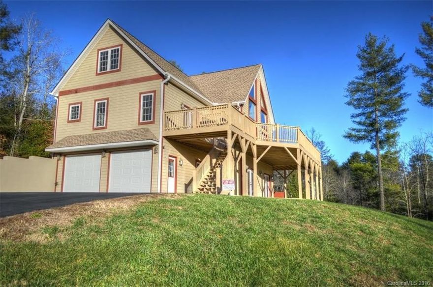 Excellent value,$112 per sq',like new, never lived in, quality finishes, dbl story great room.Large Master bedroom (about 15.5'x 19.5) w/tray ceiling opens to deck.Large family room on lower level w/full bath. Paved drive with access to kitchen,making unloading groceries a breeze.Open plan kitchen w/island & Jenn-Aire Downdraft Cooktop.Driveway re-oiled,freshly sealed/painted patio and decks. Portion of DB/PG