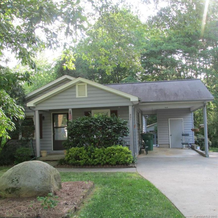 Great cottage style home in Granite Quarry.  Attached carport, partially fenced yard, storage building.  Freshly painted, appliances remain.  15 x 24 detached garage.