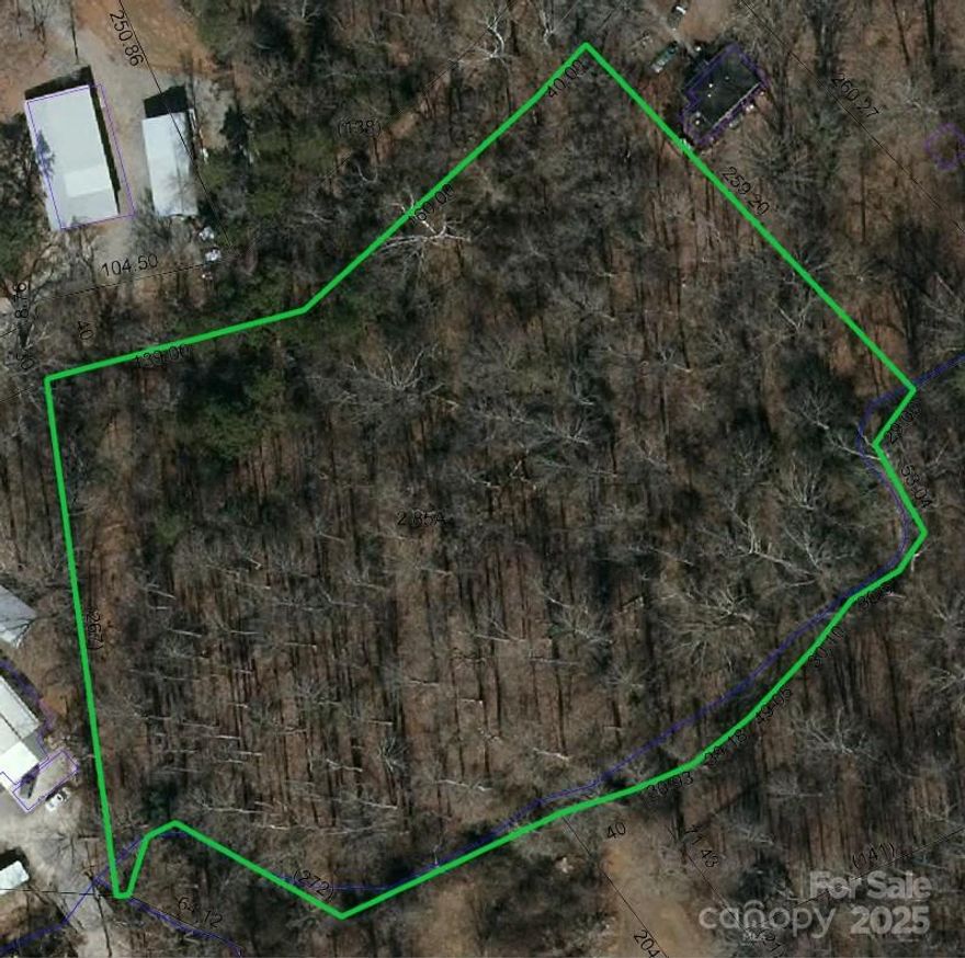 Rare opportunity to own 2.85 beautiful acres in the heart of Newton! This wooded lot offers the perfect setting for your custom dream home or potential development. The property features a gentle slope, a peaceful creek at the back, and plenty of privacy. City of Newton has given preliminary approval for development, and the lot has access to city water and sewer — making the possibilities endless! Convenient location close to downtown Newton, shopping, dining, and schools. Whether you're looking for a private homesite or a small development project, this property checks all the boxes!