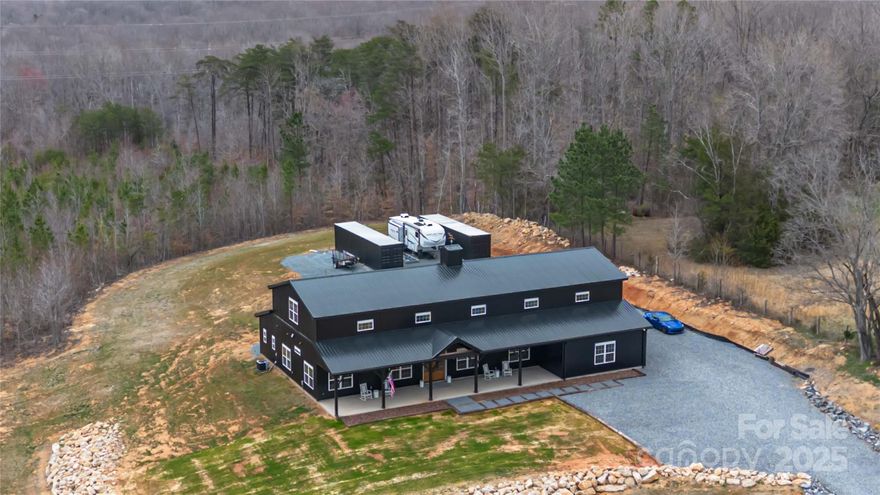 MOTIVATED SELLERS!! Welcome to this custom-built home nestled on 5 acres with views of Kings and Crowders Mountains; perfect for horses, hobbies, and entertaining. The true rocking chair front porch leads into the great room and kitchen where appliances worthy of a Michelin chef live. Upstairs you will find an additional bedroom, bathroom and living quarters that offer privacy from the main house.The  oversized, 3 car garage offers ample space for vehicles, equipment, and storage. This property is designed for function and fun featuring 2 full RV hookups and 2 Conex storage units for toys, hobbies or potential extra living space. Drastic price reductions help make this home yours!
Schedule your private tour today