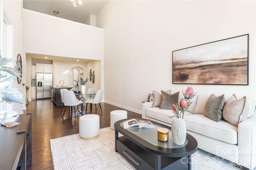 Experience refined comfort and effortless living in this impeccably maintained three-bedroom, two-and-one-half-bath townhome located in the highly desirable Berewick community.
Thoughtfully designed for both convenience and privacy, the primary suite is situated on the main level and features well-appointed finishes and generous closet space, creating a peaceful retreat from the secondary bedrooms upstairs. The open-concept kitchen seamlessly connects to the living and dining areas, offering a welcoming and functional layout ideal for both everyday living and entertaining. The kitchen is complemented by modern appliances, elegant cabinetry, and ample counter space.
Upstairs, a versatile loft with a fireplace provides an inviting setting for relaxation, a reading nook, or a home office. Two additional bedrooms offer flexibility for guests, work-from-home needs, or additional living space.
The home also includes an attached one-car garage and a separate storage room, enhancing both convenience and functionality. Residents of Berewick enjoy access to a range of community amenities, including pools, fitness facilities, walking trails, and open green spaces.
Ideally located near Charlotte Premium Outlets and Charlotte Douglas International Airport, this residence offers a balanced combination of comfort, convenience, and low-maintenance living in southwest Charlotte.