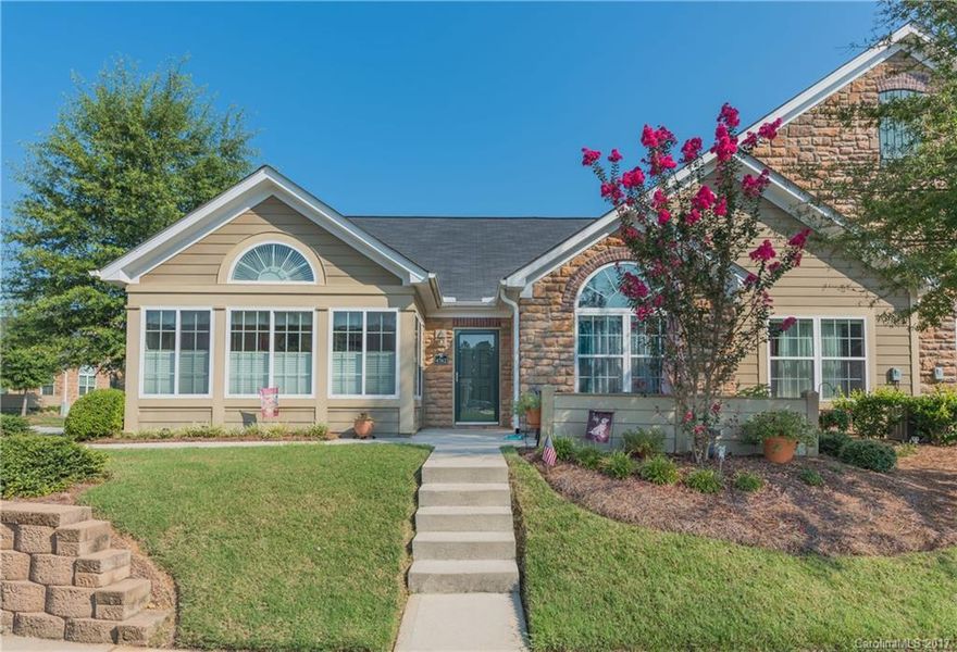 Amazing one level home with volume ceilings in every room. Loaded with features, wood floors, upgraded cabinets, granite counters, SS appliances,brushed nickel hardware. Washer/dryer remain. Den/Study being used as a 3rd bedroom but no closet. Sunroom with French Doors is another living area. Downsize to one level without giving up storage...lots of closets, utility room and separate laundry room. Walk to Harris Teeter and shopping,easy access to 485. Pool, clubhouse and fitness center too.