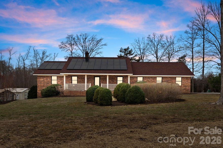 Welcome to your own private slice of the countryside. This charming 3-bedroom, 3-bath brick ranch home, built in 1985, sits on 41.2 acres of beautiful farmland, offering privacy, space, and endless possibilities. A private driveway leads you into a quiet, serene setting where nature takes center stage. The home offers a functional ranch-style layout, a 2-car attached garage, and recently remodeled bathrooms that bring added comfort and convenience. Key improvements have already been completed, including a new roof and solar panels in 2020, HVAC system replacement in 2024, and a new water heater in 2025, allowing for low-maintenance living and added peace of mind. Step outside and enjoy the abundant wildlife, including frequent deer sightings, making this an ideal retreat for nature lovers, hunters, or anyone seeking a peaceful rural lifestyle. The expansive acreage offers ample space for farm animals, farming, recreation, or simply soaking in wide-open views and fresh country air.