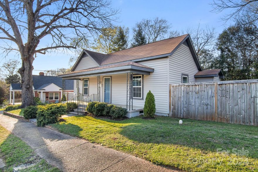 Don't miss this updated, charming, bungalow style mill house!  2 bdrms, 2 full baths, screened-in back porch, extended deck and fully fenced back yard for privacy - this home is ready to move in.  Located just steps away from Walter Elisha Park, close to Fort Mill Amphitheater and the downtown shops and restaurants - this home puts you in close proximity to annual festivals/events. In addition, you are only a few minutes drive to Anne Close Springs Greenway, the newly built Piedmont Medical Center, shops, restaurants and breweries in Kingsley and Baxter, and easy interstate access.  With a welcoming covered front porch, 10 foot ceilings, recessed lighting, large open living area, hard wood floors, built-in storage, beautifully updated kitchen w/ large island, granite counter tops, tile back splash, custom soft close cabinets, SS appliances, and updated bathrooms; this home has charm, style, and comfort all rolled into one.  In addition - no HOA and Fort Mill award winning Schools!
