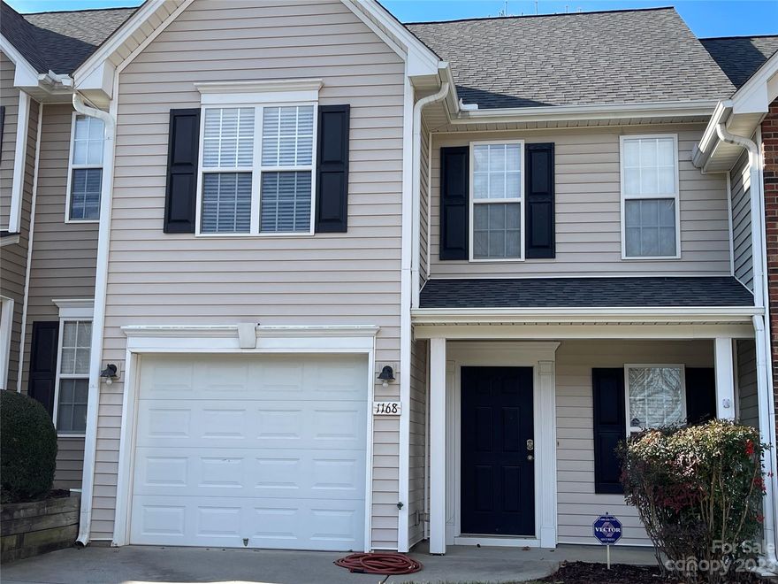 Lovely townhome in popular neighborhood! Attached 1 car garage + driveway parking. Attractive layout with new bamboo flooring, granite counters and freshly painted walls. Great room has soaring ceiling! Separate dining room could be used for office, exercise, or other uses. Spacious kitchen has stainless steel appliances with eat-in area that leads to private, relaxing patio. Nice space behind unit with some nicely landscaped land between units. Convenient 1/2 bath on main level. Both bedrooms upstairs are large and plenty of closet space! Double sink vanity in primary bathroom. Both bedrooms have their own full bath. Pull down attic stars for storage.