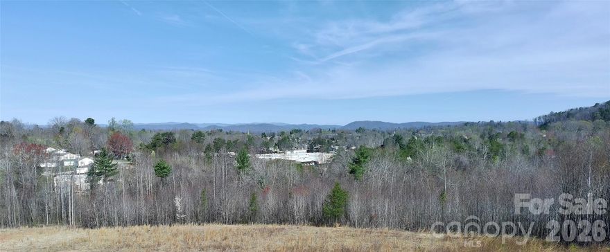 ONLY 1 Lot left! Act now! Lot 1 is still available! Amazing Property with views of the foothills. These lots have a picturesque creek running along the north side of the property. The land has been cleared and is ready for the new owner to build. The land is conveniently located just minutes of Hwy 321. This allows for a nice large lot, with all the conveniences of being in town! This could be a great location for your dream home, or a great second home. Property has been flagged Sewer is possible, but likely more cost effective to go with septic.   For GPS, use 704 Westway Pl SW 28645 entrance is the lot to the west.