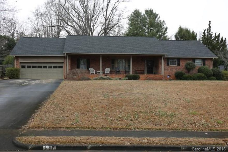 Established neighborhood with sidewalks and park. Well maintained, move in ready, brick ranch with rocking chair front porch. Four bedrooms, living, dining, large kitchen and laundry room and a craft room.  Beautiful hardwoods throughout the house.  Large fenced backyard with extra garage (24x24) and mature landscaping.