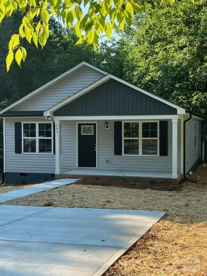 Beautiful open floor plan, LVT throughout except carpet in the bedrooms. Custom soft close cabinets in the kitchen with stainless steel appliances. Refrigerator is not included. Ceiling fans in all 3 bedrooms. Nice large deck 12 x 10 on the back of the house. Move in ready. Building in back yard is "as is"
