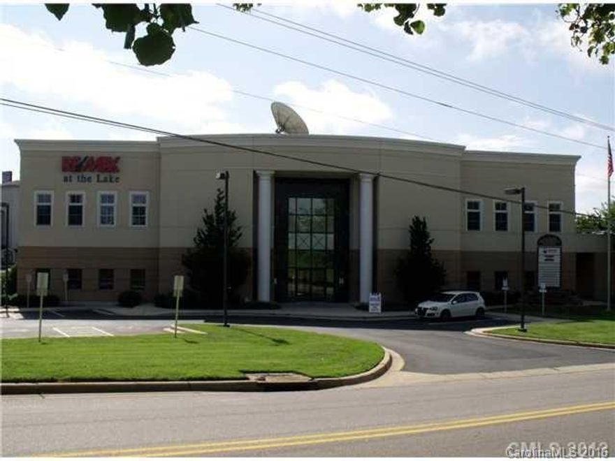 Great investment opportunity with this fully leased building.  Great location with easy access and visibility from I-77.  Close to all retail, Lowes Corporate, Hospital, and much more.  1st floor recently renovated and updated. Fronts pond.  Lower level had access to rear patio.