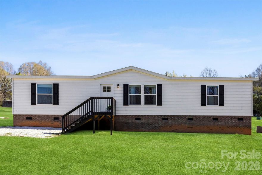 Built in 2024, this home sits on a full acre and features 2 bedrooms and 2 bathrooms with a bonus room- perfect for a first-time homebuyer! As you step inside, you’re greeted by an open floor plan with modern touches throughout. The kitchen is beautifully designed with a large island featuring a built-in sink and dishwasher, along with plenty of storage. It’s completed by a built-in nook that’s perfect for a command center or coffee bar. The laundry room is conveniently located just off the kitchen and includes its own walk-in closet for additional storage. The primary suite offers both comfort and functionality, featuring a private bathroom and two walk-in closets. Each additional bedroom also includes its own walk-in closet. Step outside to find a yard that’s perfectly suited for your furry or barnyard animals. With no HOA, you have the freedom to make this property truly your own. Enjoy breathtaking rural sunsets in Union County right from your front porch where peace and privacy meet. That kind of lifestyle awaits you at 6011 Austin Road. Schedule your showing today!