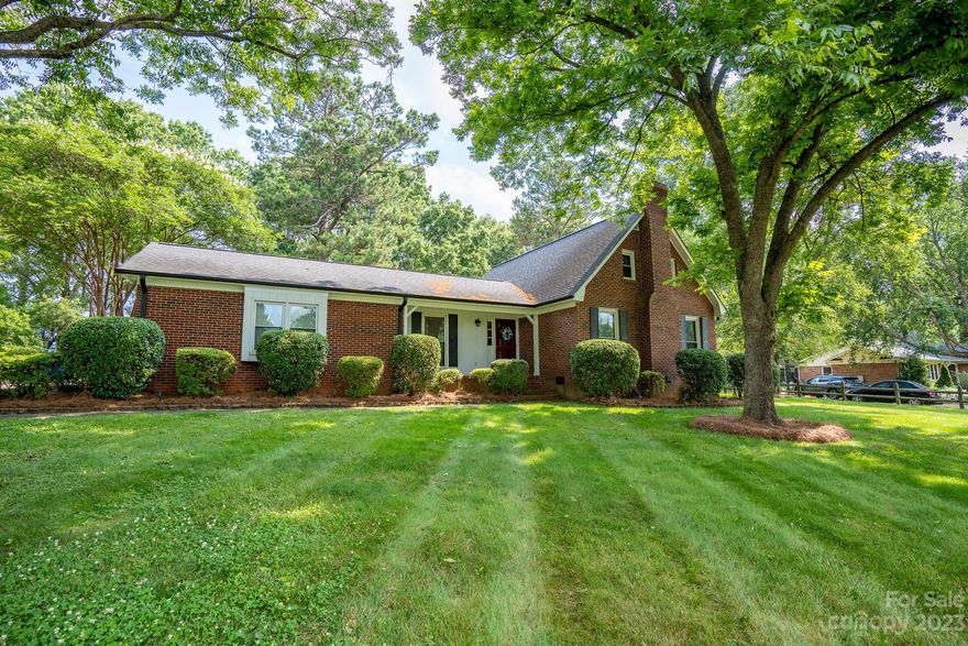 "ESTATE SALE'  Brick 1/2 Story that sits on beautiful .71 lot with mature landscaping/ NO HOA!! Sit on front porch and enjoy view of pond across the street/Enjoy sitting on screen porch overlooking back yard that is fenced/2 Car side load garage/Formal DR accented with HDW floors/Breakfast and Kitchen have HWD floor and lead to screen porch/Large laundry room with pantry closet/Family Room has fireplace/ Primary BR on main level and 2BR's on upper level/the Bathroom upstairs and 1/2 Bath on main level have been updated. ** Primary BA toilet had leak and subfloor is in need of repair**  This home has great potential / Close to downtown Mint Hill and the Veterans Park.   **Back on Market- no fault of sellers**