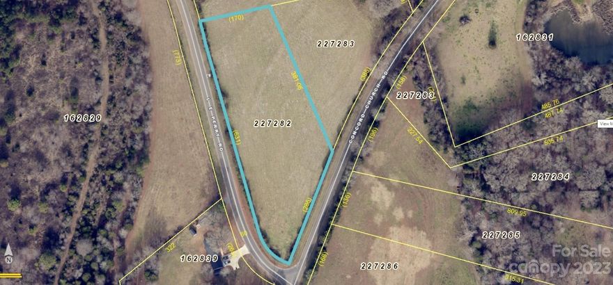 2.39 Acres--cleared on a corner lot (corner of Concord Church Rd. and L. E. Perry Rd.)  Road frontage on L. E. Perry Road is 631' and on Concord Church Rd. is 286'.