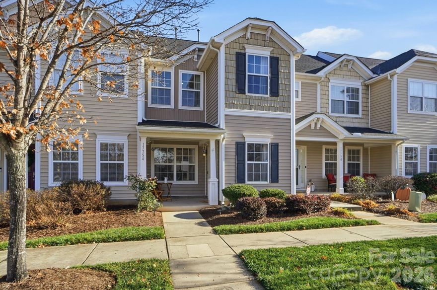 A rare find...a home under 300k! This charming 2-bedroom, 2.5-bath townhouse is the perfect gift to yourself! Step inside to discover a beautifully updated, stylish home that makes everyday living feel joyful.

Step onto the covered front porch and enter the main level which flows seamlessly from foyer to living room, dining & kitchen.  The kitchen showcases new stove, dishwasher and quartz countertops, backsplash and sink.  Refrigerator and LVP flooring all new in 2022.  Enjoy a private back patio with wooded views, storage and privacy fencing—an ideal spot for sipping hot cocoa now or hosting a BBQ in spring! Guests will appreciate the 1/2 bath centrally located on the main level.  Upstairs, you’ll find two spacious bedrooms, each with its own ensuite, giving everyone their own cozy retreat. The included washer, dryer, and refrigerator make moving in a breeze.

The neighborhood boasts impressive amenities & diversity: pool, clubhouse, gym, playground, sidewalks, and a welcoming mix of townhomes and single-family homes.

Located within top-rated schools and just minutes from shopping, restaurants, coffee spots, and local pubs, this area makes holiday errands—and everyday living—effortless. With quick access to major highways, Charlotte and the charming towns of Cornelius, Davidson, and Huntersville, you’ll love the convenience, comfort & character.

Kick off your New Year with a New Home!