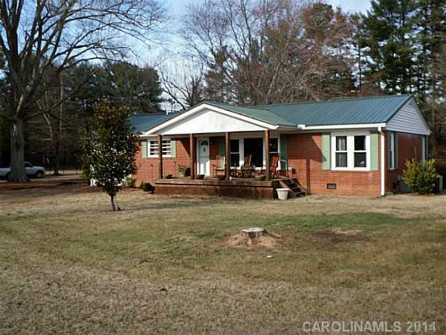 Welcome home to 3 bedroom ranch with updates throughout. Nestled on a corner lot with over 2 acres. Fenced yard with plenty of room. Workshop in building at rear of house. Front porch to sit on and watch sunset. Open with split bedroom plan. Hardwoods throughout except tile in laundry room and bathrooms. A must see!!!