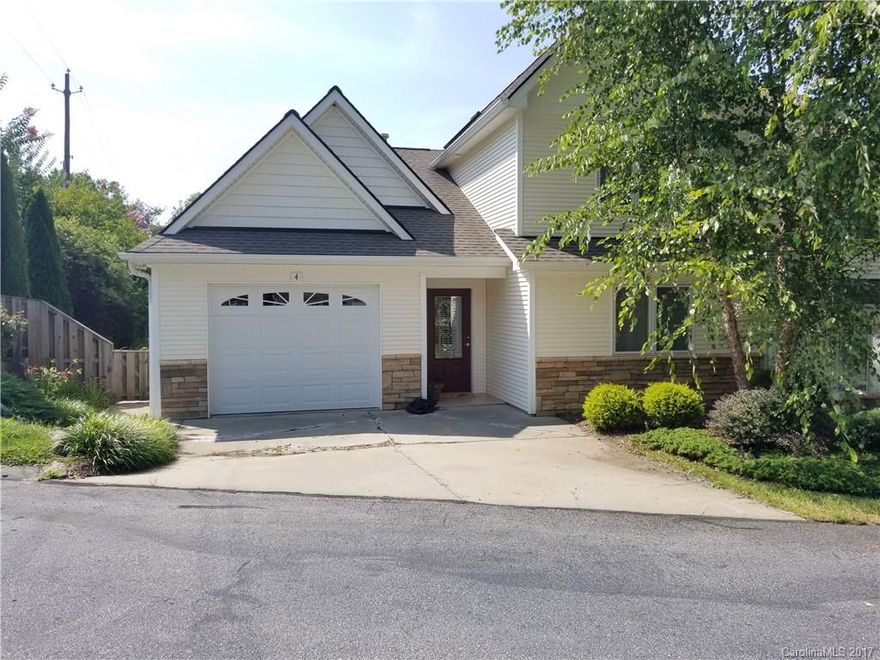 Rarely available Bee Tree Village 2 bedroom, 2.5 bath with 2nd master upstairs and private. Attractive and light open floorplan with vaulted ceilings and gas fireplace. Many upgrades including wood floors and plantation shutters make this charming home one you won't want to miss. Single car garage on main level