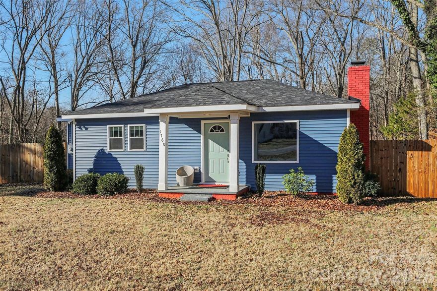 Welcome to this adorable, fully renovated bungalow set on nearly one acre of beautifully fenced, private land, backing to peaceful woods just minutes from downtown Davidson and a short drive to downtown Mooresville. This charming home blends classic character with thoughtful modern updates and is sure to impress.

Inside, you’ll find two spacious bedrooms and a beautifully updated bath with an open, inviting layout filled with natural light. The kitchen features abundant cabinetry and generous counter space, offering both functionality and plenty of room for everyday cooking or entertaining. Cozy living areas showcase attractive flooring and a warm, welcoming atmosphere.

Step outside to enjoy the expansive fenced backyard, ideal for outdoor living, gardening, or hosting gatherings. Additional highlights include a large deck and patio and ample driveway parking.

*** Buyers may receive a $3500 credit toward closing costs or a rate buy-down when using the preferred lender. Ask your agent for details!
** Fireplace sold "AS IS"