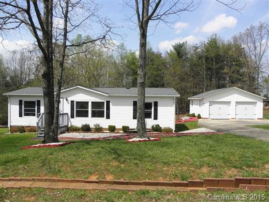 Current owner's found a diamond in the ruff, and with their years of love and sweat have transformed this into a beautiful ranch style home. Large open floor plan that includes a spacious living, dining, and kitchen area with many cabinets and a great use of space. Large master bedroom and bath with good sized secondary bedrooms sharing a hall/guest bath. Awesome Large detached garage with room for a workshop and loads of attention went into designing a beautiful landscape to surround this home.