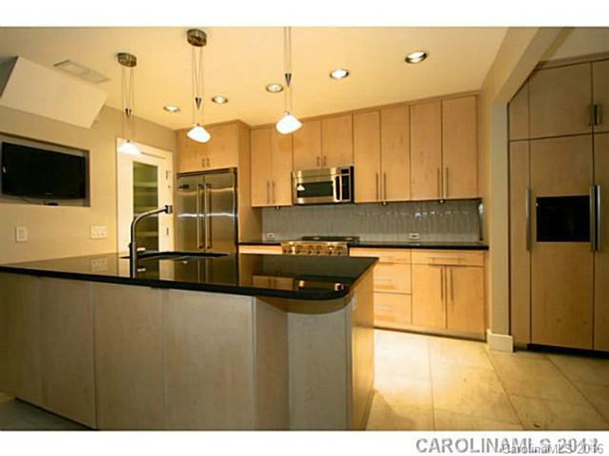 Absolute luxury in the Heart of Fourth Ward.  Two oversized terraces and a front and rear yard.  Gourmet kitchen features Viking appliances, custom cabinetry, 2 refrigerators and induction range.  Fountain and gated carport.  Too many extras to list.